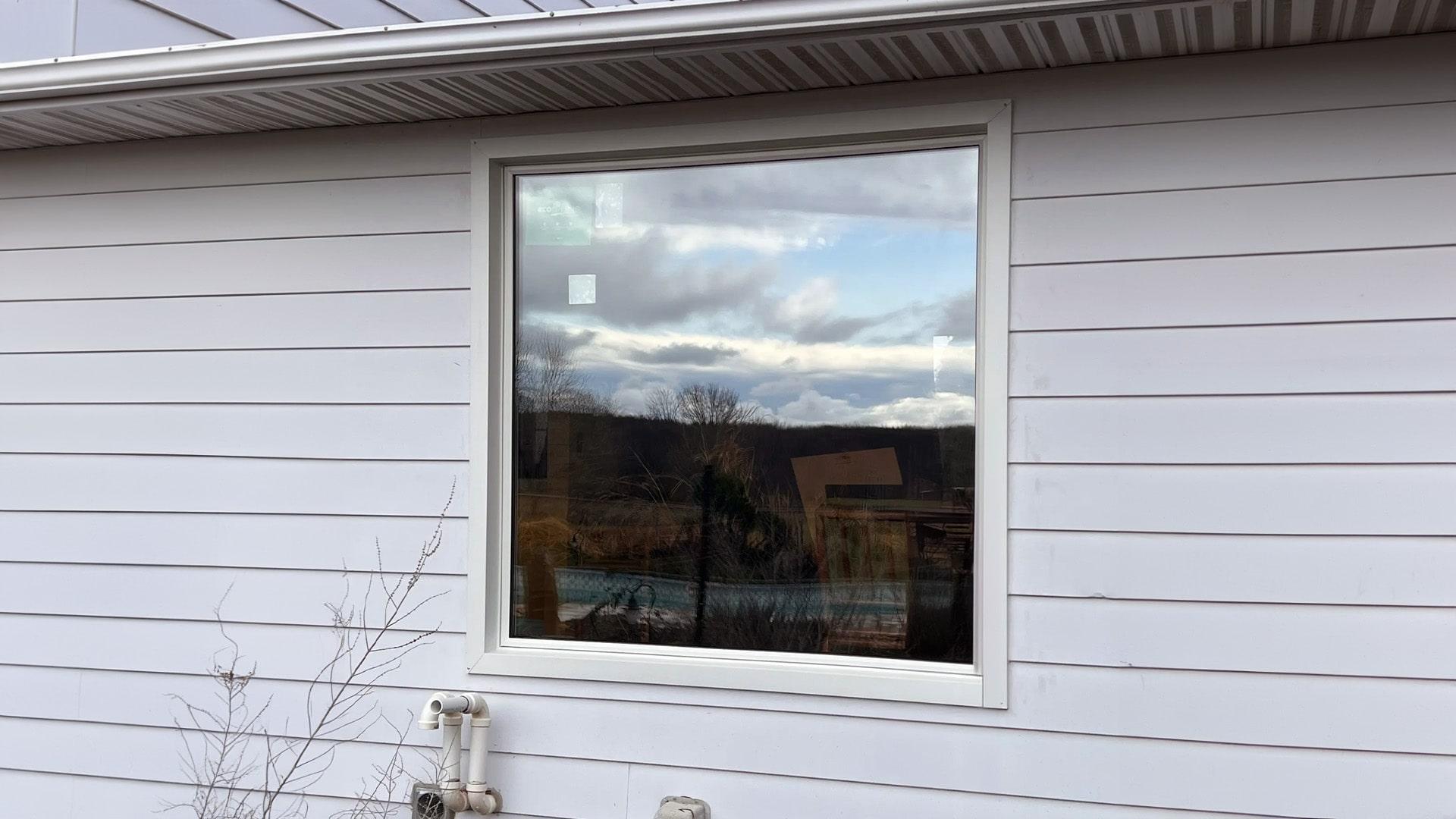 Home's exterior view after window installation